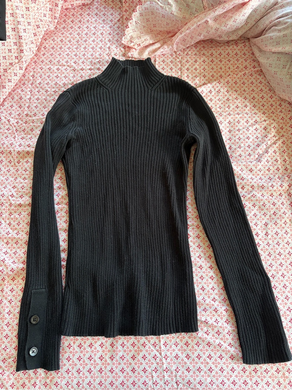 Black ribbed knitted turtleneck sweater